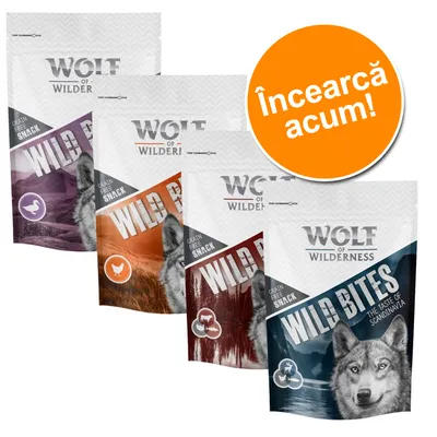Pachete Wolf of Wilderness Wild Bites, Grain Free Snack, diverse sortimente. Text vizibil: „Încearcă acum!” pe un cerc portocaliu.