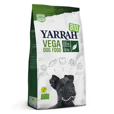 Упаковка корма для собак YARRAH VEGA DOG FOOD BIO, белок 22 %, жир 13 %, значки: вегетарианский, органический, 100 % перерабатываемая упаковка. Изображение собаки на передней части.