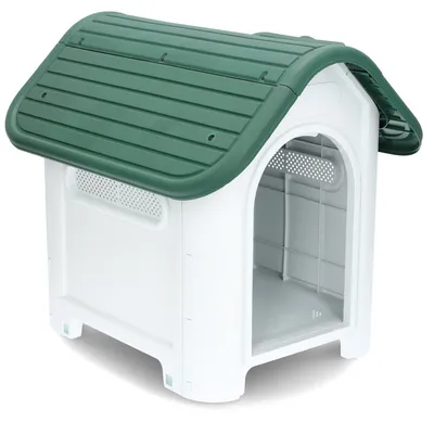 Cuccia bianca per cani in plastica con tetto verde e fessure di ventilazione laterali. Ingresso aperto senza porta.
