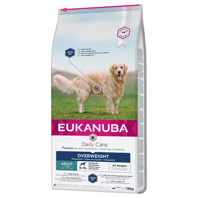 Sac de croquettes Eukanuba Daily Care Overweight pour chien adulte, toutes races S–XL, 12 kg, mention «50% de matières grasses en moins*» visible sur l’emballage.