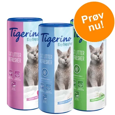 Tigerino Refresher Cat Litter Refresher dåser med kattebillede, varianter: baby powder, fresh cotton, spring meadow. Tekst på orange cirkel: Prøv nu!
