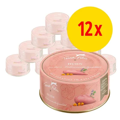Terra Felis Huhn, 12 Dosen. 100% Lebensmittelqualität, Das Paradies im Katzennapf, Abbildung von Hühnerfleisch auf der Dose. Terra Felis Huhn, 12 Dosen. 100% Lebensmittelqualität, Das Paradies im Katzennapf, Abbildung von Hühnerfleisch auf der Dose.
