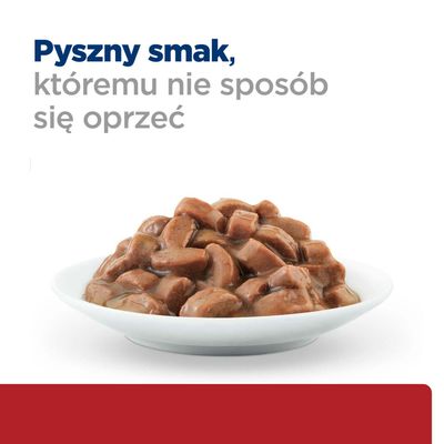 Talerz z kawałkami brązowego mięsa w sosie. Tekst: Pyszny smak, któremu nie sposób się oprzeć.