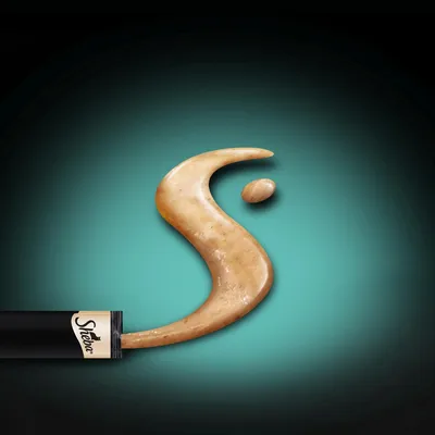 Sheba cat food cream from tube shaped as a curved letter S on a turquoise background.