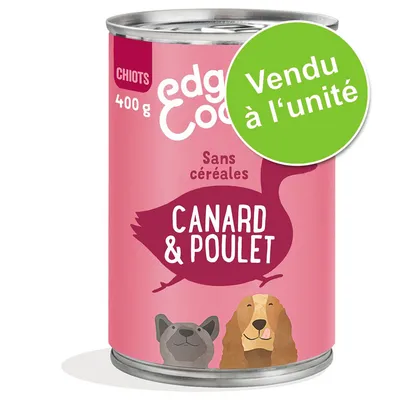 Boîte pour chiots 400 g, sans céréales, saveur canard & poulet, vendu à l’unité. Illustrations de deux chiens sur l’étiquette.