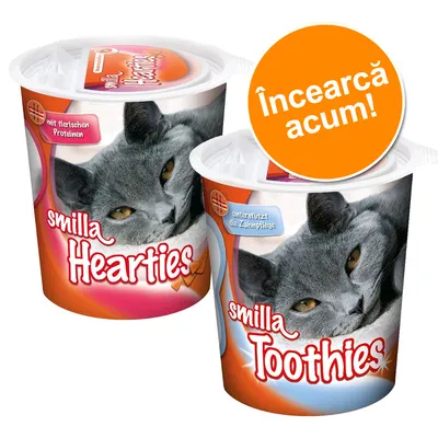 Două recipiente cu imagine de pisică, text vizibil: smilla Hearties, smilla Toothies, mit tierischen Proteinen, unterstützt die Zahnpflege, Încearcă acum!