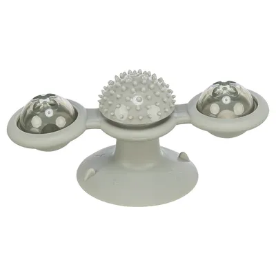 Jouet interactif gris en plastique avec ventouse, deux boules transparentes à picots et une partie centrale texturée à picots. Aucun texte ou marque visible. Jouet interactif gris en plastique avec ventouse, deux boules transparentes à picots et une partie centrale texturée à picots. Aucun texte ou marque visible.