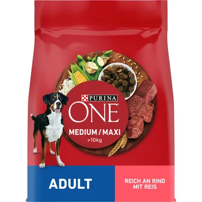 Purina ONE Medium/Maxi Adult, bogat în vită cu orez, pentru câini peste 10 kg. Ambalajul arată ingrediente precum carne, cereale și legume.