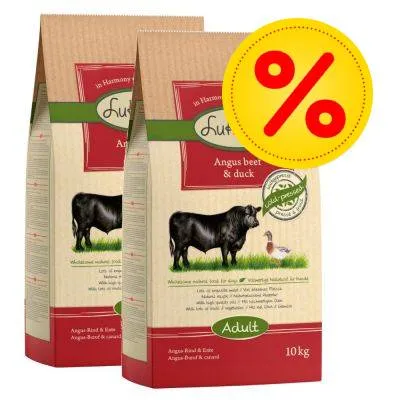 Dvě balení krmiva pro psy Lukt Angus beef & duck, Adult, 10 kg, s obrázkem býka a kachny na obalu. Žlutý symbol procenta označující akční nabídku. Dvě balení krmiva pro psy Lukt Angus beef & duck, Adult, 10 kg, s obrázkem býka a kachny na obalu. Žlutý symbol procenta označující akční nabídku.