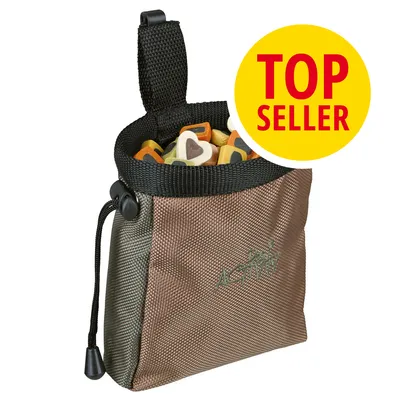 Textilní pamlskovník s nápisem Dog Activity, naplněný barevnými pamlsky ve tvaru srdce. Žlutý kruh s červeným textem TOP SELLER.