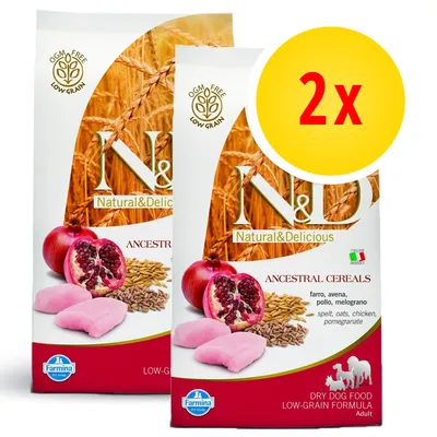 2 confezioni di Farmina N&D Natural & Delicious Ancestral Cereals, farro, avena, pollo, melograno. Scritta OGM FREE LOW GRAIN. Prodotto italiano. Immagini di melograno e cereali.