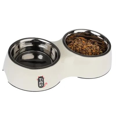 Tiaki double bowl made of stainless steel, one bowl filled with water and one with dry food.