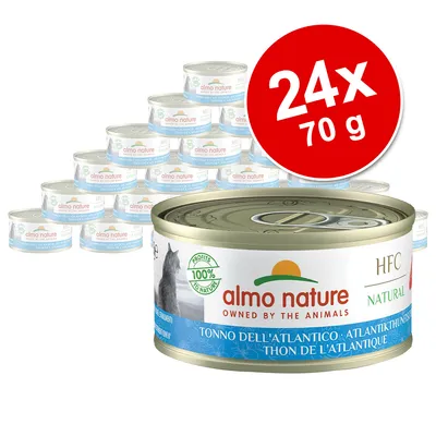 Multipack of 24 tins, each 70g, Almo Nature HFC Natural Atlantic tuna. Label shows 100% profits to nature and product details in multiple languages.