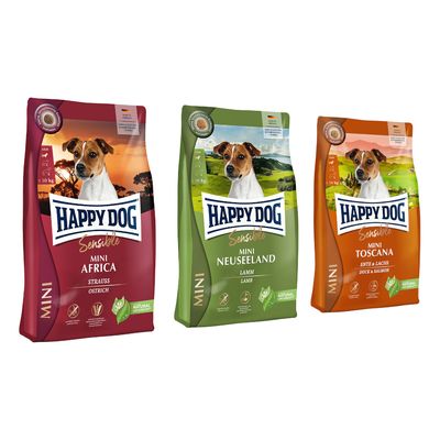 Pack gourmand Happy Dog Sensible Mini Ireland, saumon et lapin, pour chiens adultes ≤10 kg. Trois sacs visibles avec texte 'Pack gourmand' sur un cercle rouge.