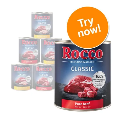Rocco Classic Pure beef 800g tin, visible text: 100% fresh ingredients & grain-free. Other Rocco Classic tins in background. Orange badge reads Try now!