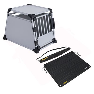 Cage de transport en métal et plastique avec grille, tapis noir ROLLIMAT à côté, pastille rouge avec texte 'Prix mini' en haut à droite.