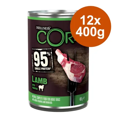 Boîte Wellness CORE 95 % single protein, agneau avec citrouille, 400 g. Lot de 12 x 400 g indiqué sur un cercle orange. Texte en anglais visible sur l’étiquette.