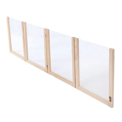 Barrière pliable à quatre panneaux avec cadre en bois clair et panneaux transparents, logo TIAKI visible sur le coin inférieur droit.