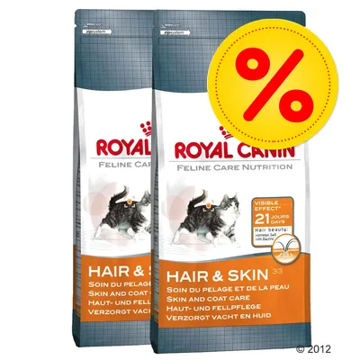 Två påsar Royal Canin Feline Care Nutrition Hair & Skin 33, synlig effekt efter 21 dagar, stor röd procent-symbol för erbjudande.