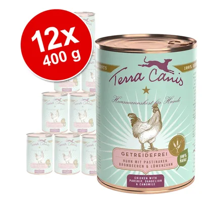 Lot de 12 boîtes Terra Canis 400 g, étiquette visible : Getreidefrei, Huhn mit Pastinaken, Brombeeren & Löwenzahn, 100 % Natur, illustration de poule. Texte en allemand et anglais.