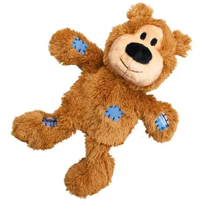 Braunes Plüschspielzeug in Bärenform mit blauen Flicken an Armen, Beinen und Körper.