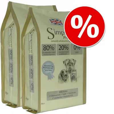 Simpsons Premium dry dog food, 2 x 2kg bags. 80% chicken/fish/turkey, 20% fruit/vegetables/botanicals, 0% grain. Red percentage discount symbol shown.