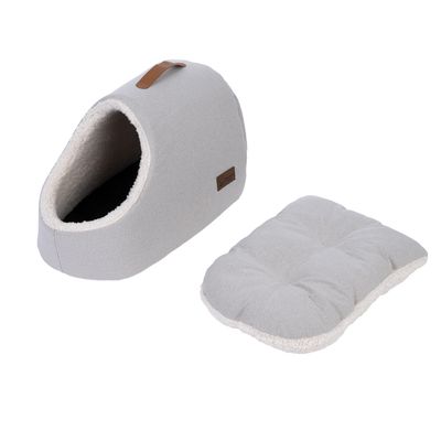 Cama para mascotas gris con forma de cueva y cojín extraíble, interior acolchado suave, asa de cuero en la parte superior. Adecuada para comodidad y descanso.