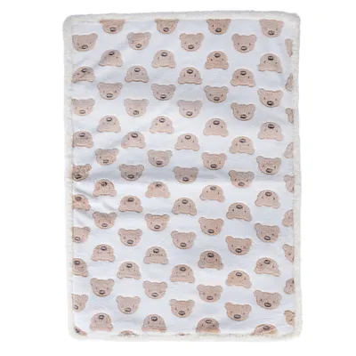 Pehmeä beige-valkoinen viltti karhukuviolla, sopii lemmikeille tai koristekäyttöön.