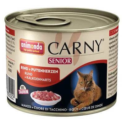Blik Animonda Carny Senior kattenvoer, rund en kalkoenharten, met taurine. Afbeelding van een kat en vlees in een kom op het etiket. Tekst: Rind + Putenherzen, Rund + Kalkoenharst.