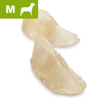 Deux friandises à mâcher en peau naturelle, taille M indiquée par une icône verte avec un chien et la lettre M en haut à gauche.