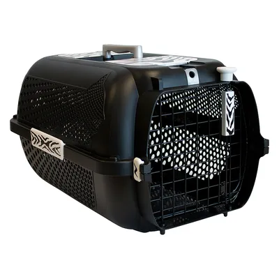 Black plastic pet carrier with ventilation holes, a secure metal door, and a handle on top for carrying. Decorative white patterns are visible on the sides and door latches.