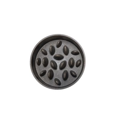 Round black feeding bowl with raised oval elements to slow down food intake.