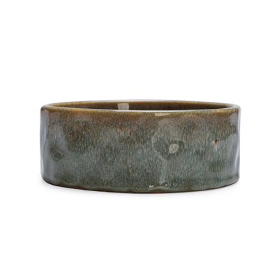 Ciotola rotonda in ceramica verde con superficie liscia, adatta per cibo o acqua.