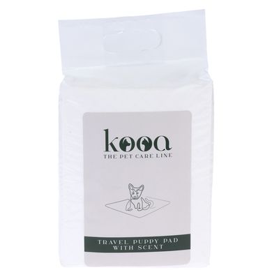 kooa The Pet Care Line. Travel Puppy Pad with scent, packaging with illustration of a dog on a mat.