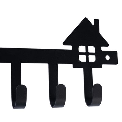 Black metal hook rack with three hooks and house motif, suitable for hanging items.