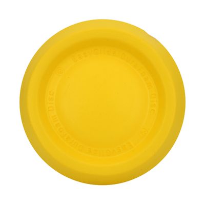 Žltý EasyGlide DuraFoam Disc s vyrazeným nápisom, okrúhly dizajn.