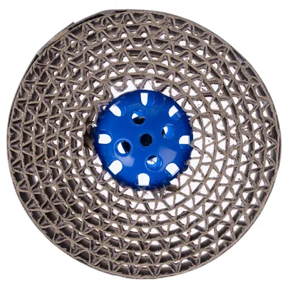 Round toy made of cardboard with a blue plastic element in the centre, suitable for interactive play.