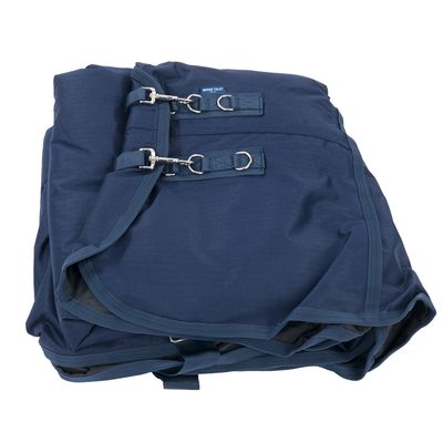 Coperta per cavalli blu con fibbie metalliche e cinghie, marca Horse Tales visibile sull'etichetta.