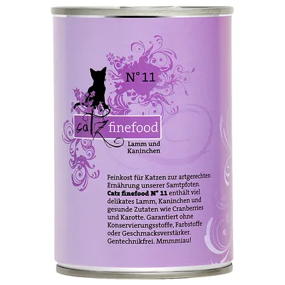 Catz finefood No 11 tin with lamb and rabbit, contains cranberries and carrot, free from preservatives, colourings, flavour enhancers and GMOs. German text visible on label. Catz finefood No 11 tin with lamb and rabbit, contains cranberries and carrot, free from preservatives, colourings, flavour enhancers and GMOs. German text visible on label.