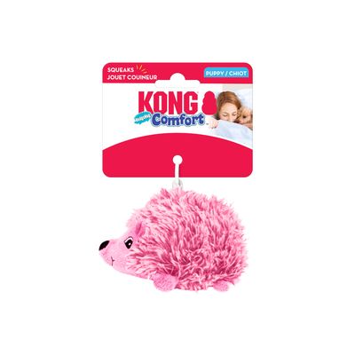 KONG Comfort jucărie pentru căței, arici roz din pluș, scârțâie la joacă. Ambalaj cu denumirea produsului și categoria: Puppy/Chiot.