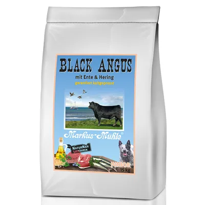 Zak Markus-Mühle Black Angus Junior hondenvoer, 15 kg. Tekst: mit Ente & Hering, garantiert kaltgepresst, Naturnah ernähren. Afbeeldingen van rund, eend, haring en hond zichtbaar.
