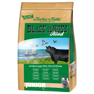 Markus-Mühle Black Angus Rind JUNIOR, 15 kg. Text: mit Black Angus Rind, Ente und Hering. Obraz krávy, psa, lodě a ptáků na obalu.