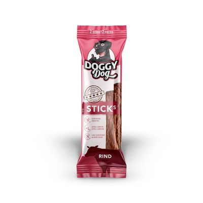Emballage Doggy Dog Sticks bœuf, 2 pièces. Texte visible : sans céréales, extra L-carnitine, sans sucre ajouté. Illustration de chien et mention 'Rind Beef'.