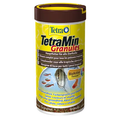 Boîte TetraMin Granules, aliment complet pour poissons tropicaux, texte visible : BioActive Formula, santé, couleurs et vitalité. Images de poissons sur l’emballage.