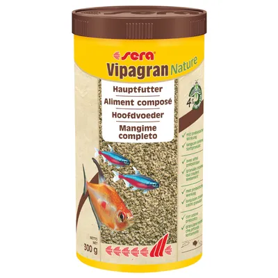 Boîte de 300 g Sera Vipagran Nature, aliment composé pour poissons, texte multilingue et images de poissons sur l’emballage.