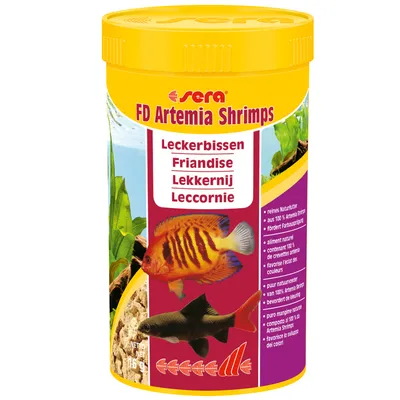 Boîte Sera FD Artemia Shrimps, friandise pour poissons, texte visible : 'Friandise', images de deux poissons, poids net 16 g, informations en plusieurs langues sur la composition naturelle.