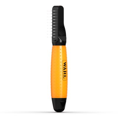 WAHL vachtverzorgingskam met oranje, antislip handgreep en metalen pinnen.