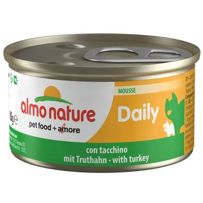 Konzerva almo nature Daily Mousse, pet food + amore, con tacchino, mit Truthahn, with turkey, 85 g. Žluté a zelené balení s obrázkem kočky.