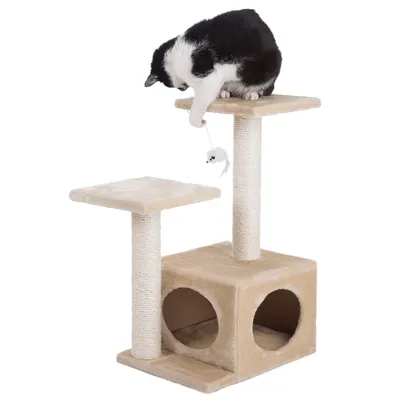 Cat tree with two platforms, cave and toy mouse. Cat playing with the mouse on the top platform. Cat tree with two platforms, cave and toy mouse. Cat playing with the mouse on the top platform.