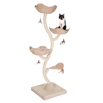 Cat tree with four levels made of woven natural material, hanging feather toys and padded resting areas. Black and white cat sitting on the top level.